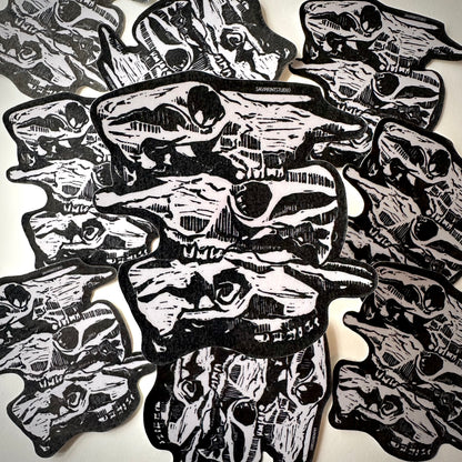 Bones, cow skulls, printmaking, black ink